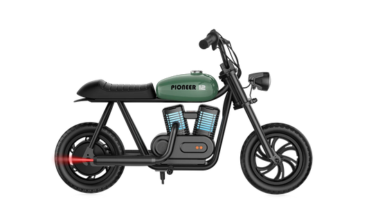 Green eMOTO Hyper Gogo Pioneer 12 Plus electric bike without training wheels, side view on a white background