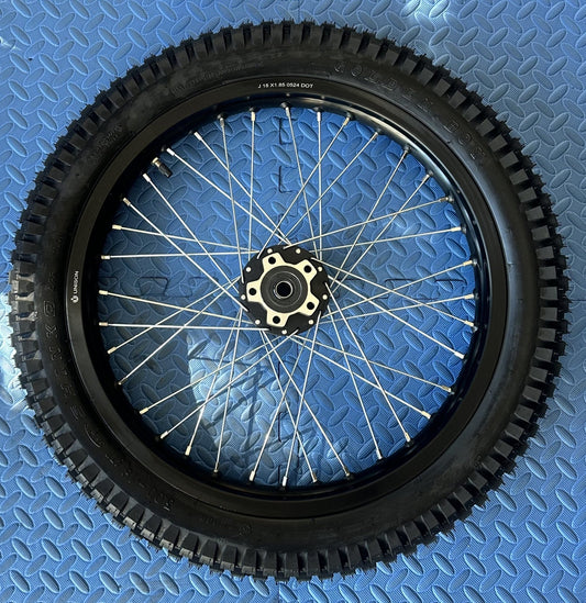 eMoto Shinko 241 Dual Sport 18" rear wheel and tire set for eMoto bikes, providing superior durability and traction for off-road and on-road adventures, designed for smooth and reliable performance in all conditions.