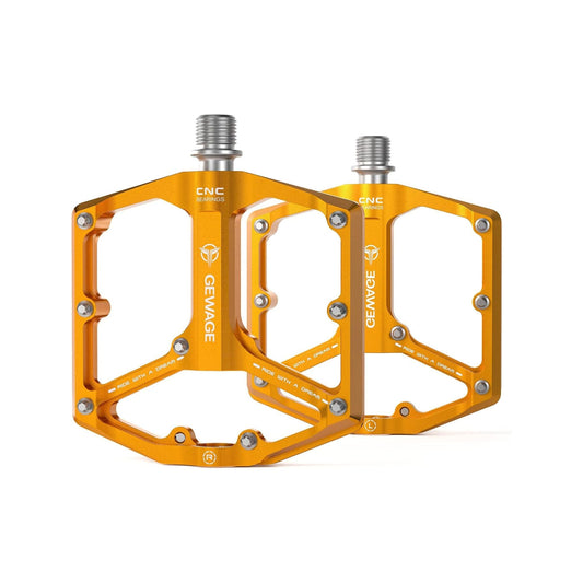 Orange alloy bicycle pedals, model 85, shown in product image.