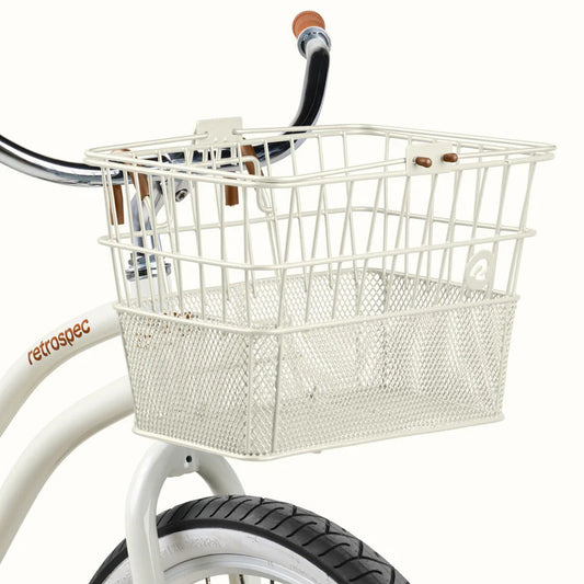 Retrospec Apollo steel bike basket in eggshell color, mounted on an eBike, front view