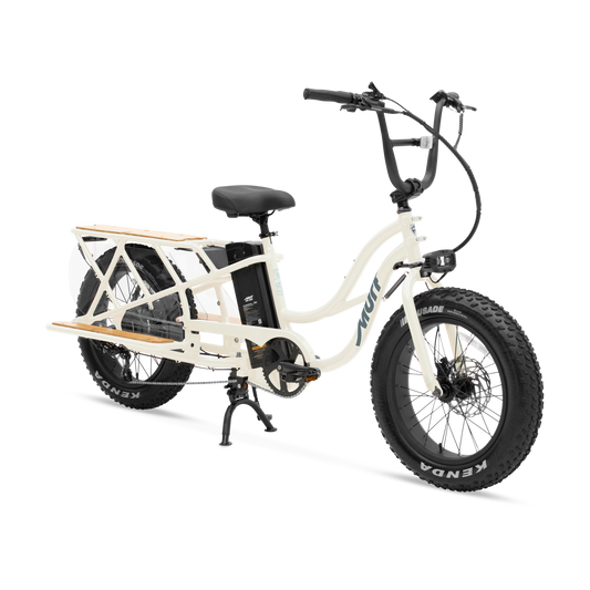 Side view of the Murf Higgs Cargo eBike in Bone color, showcasing its sturdy frame, large cargo rack, and wide tires.