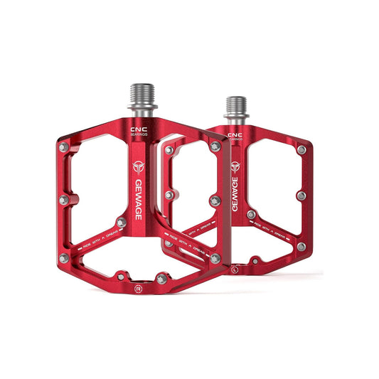 Red alloy eBike pedals with a textured surface, shown in a product image.