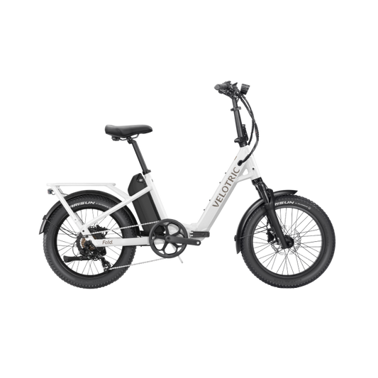 Pearl White Velotric Fold 1 Plus electric bike, folded, side view, against a plain background