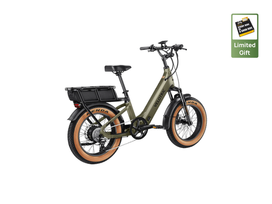 A Velotric GoMad eBike in Sage color, side view, showcasing its frame, wheels, and battery.
