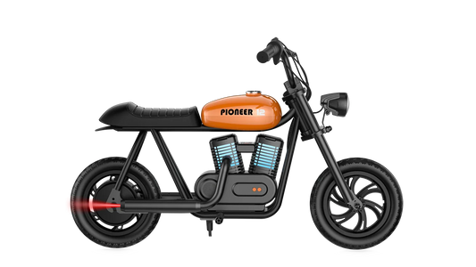 Orange eMOTO Hyper Gogo Pioneer 12 Plus electric bike without training wheels, side view on white background