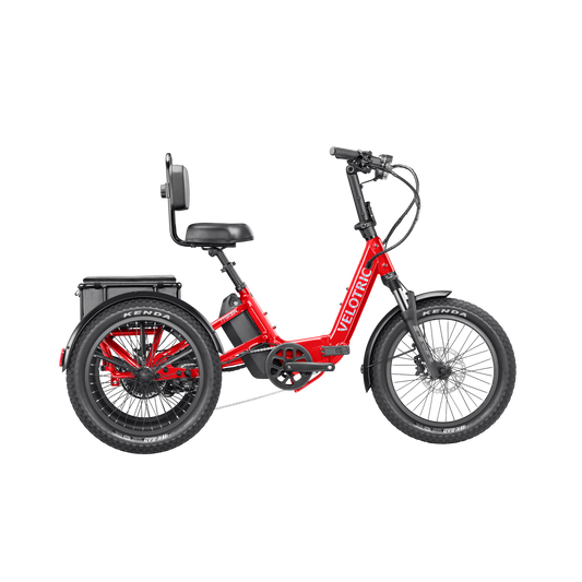 A cherry crimson Velotric Triker eTrike shown from a side angle, highlighting its three-wheel design and modern frame.