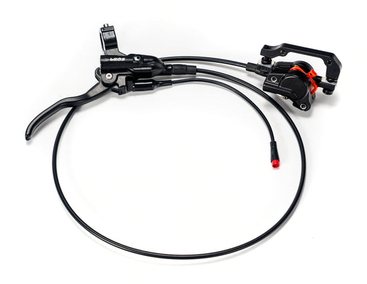 Stomp Ebox EBX front brake system showing caliper, brake lever, and connecting hose against a white background.