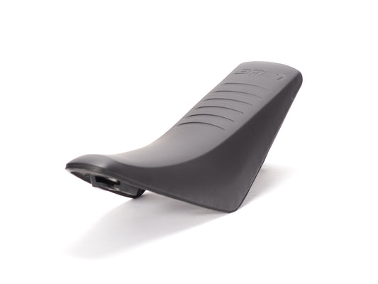 Stomp Ebox Stock Seat, black motorcycle seat with textured surface, side profile view on white background