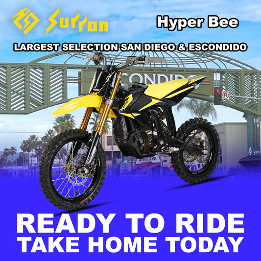 Yellow Surron Hyperbee eMOTO electric motorcycle, model R2R, serial number 00810206241875, side view.
