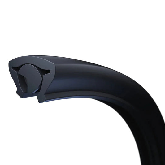 A close-up view of a Tannus Fusion bicycle tire, highlighting its unique puncture-resistant design and hybrid foam-rubber construction.