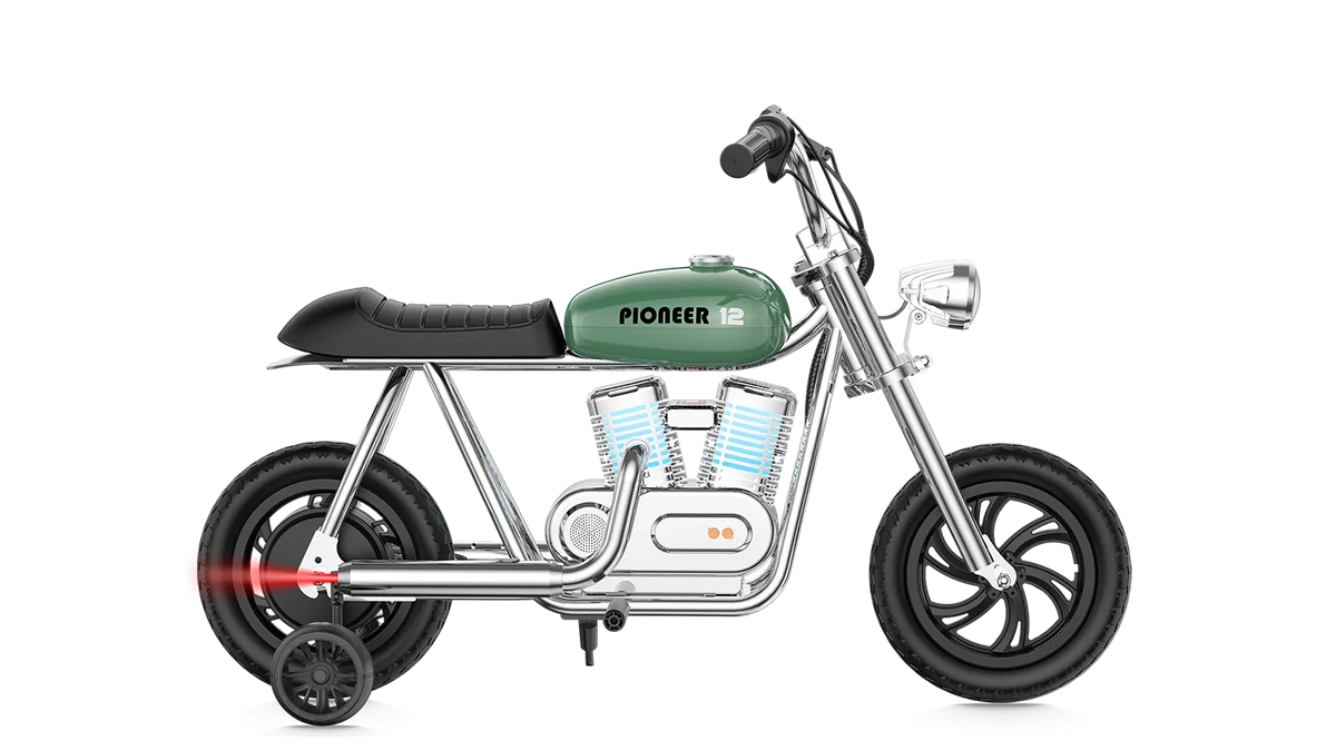 Green eMOTO Hyper Gogo Pioneer 12 Plus electric bike with training wheels, shown in side view, featuring app connectivity.