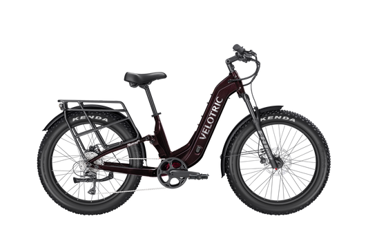 Velotric Nomad 2X Step-Thru eBike in side view, showcasing its sturdy frame, step-thru design, wide tires, and integrated battery.