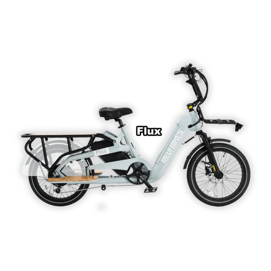 Gray eBike Revi Flux packaged inside its box, showing the bike securely packed for shipping.