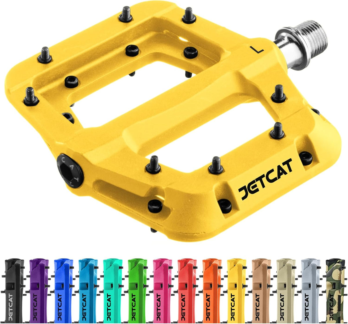 Yellow JetCat eBike pedals with a sleek design, shown against a plain background.