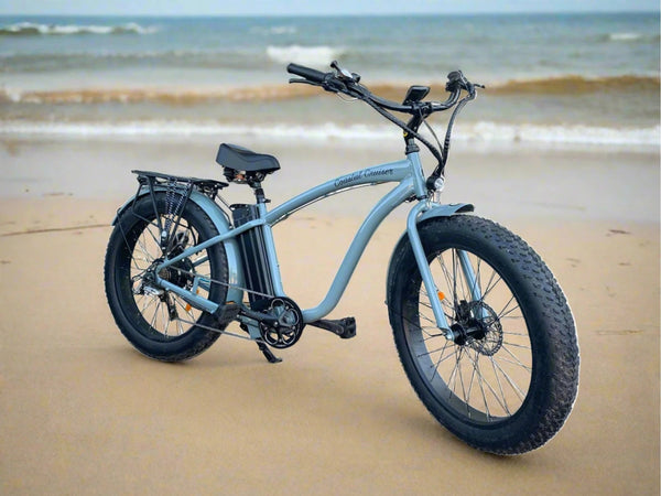 The Coastal Cruiser 52V 26 Over Step Over eBike is a Fat Tire 26 inch electric bike with a powerful 750W motor and a long distance 48v 21ah battery The Coastal Cruiser 52V 26 Over Step Over eBike is a Fat Tire 26 inch electric bike with a powerful 750W motor and a long distance 48v 21ah battery