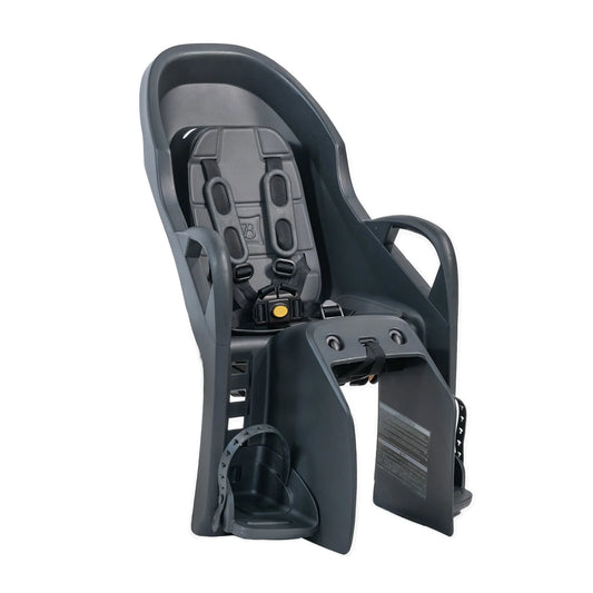 Burley Dash RM child bike seat mounted on an eBike, shown from the side with footrests and safety harness visible.