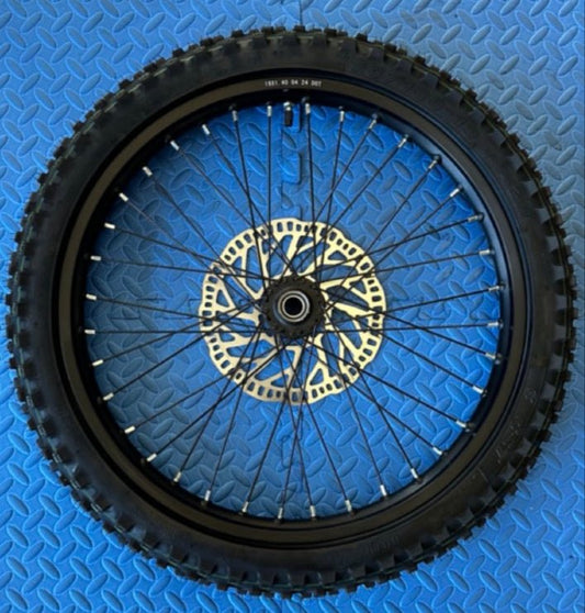 eMoto CST Knobby 19" front wheel and tire set for eMoto electric dirt bikes, made for Talaria, Surron, ERIDE Pro, available at eBike Super Shop, offering excellent grip and durability for off-road trails, built to perform on challenging terrains with lasting reliability.