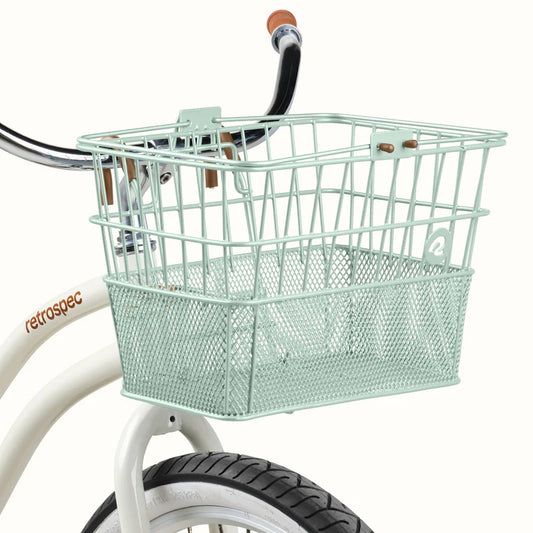 Retrospec Apollo steel bike basket in matcha green, mounted on the front of an eBike.