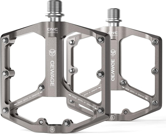 Silver eBike pedals with a metallic finish, shown against a plain background.