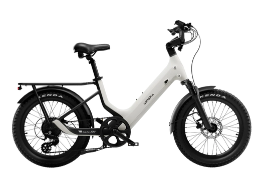 Urtopia Carbon Joy eBike in Creme color, side view, showcasing lightweight carbon frame and modern design.