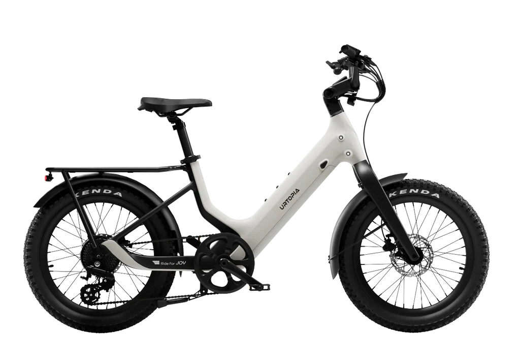 Urtopia Carbon Joy Ultra eBike in creme color, side view, showcasing lightweight carbon frame and modern design.