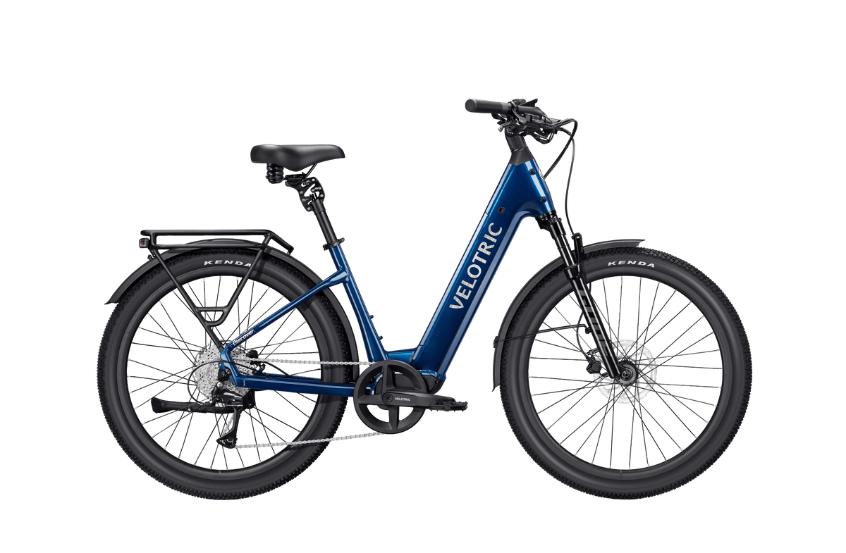 Velotric Discover 3 electric bike in Lemans Blue, side view, against a white background