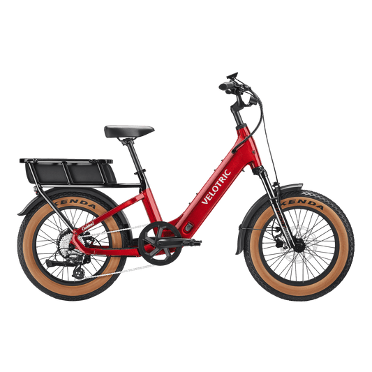 Velotric GoMad eBike in Dark Amber color, side view, showcasing its frame, wheels, and battery against a plain background.