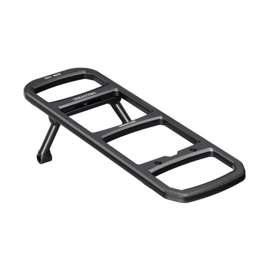 Velotric Summit 2 modular rear rack attached to an e-bike, shown in a studio setting with a clear view of the rack’s structure and mounting points.