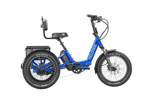 Electric blue Velotric Triker eTrike, side view, three-wheel electric bike with black seat and handlebars