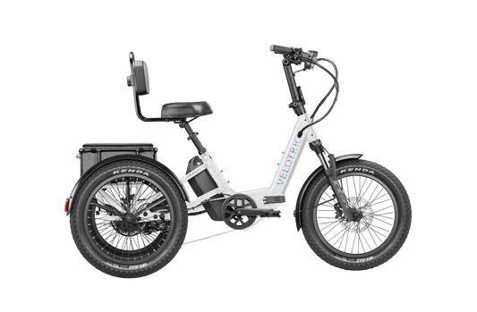 Pearl White Velotric Triker eTrike, side view, three-wheel electric bike with step-through frame and rear cargo basket