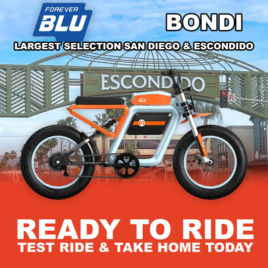 eMOTO eBike ForeverBlu Bondi in blue and orange, side view, ready to ride, with orange accents on wheels and frame