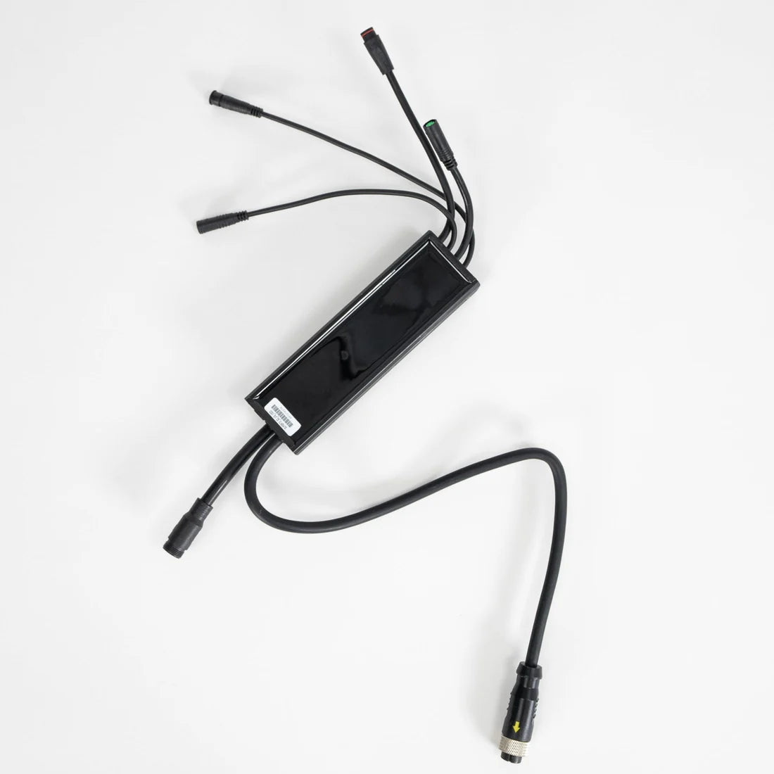 Close-up view of a Super73 S-Series electric bike controller, showing wiring connections and electronic components.