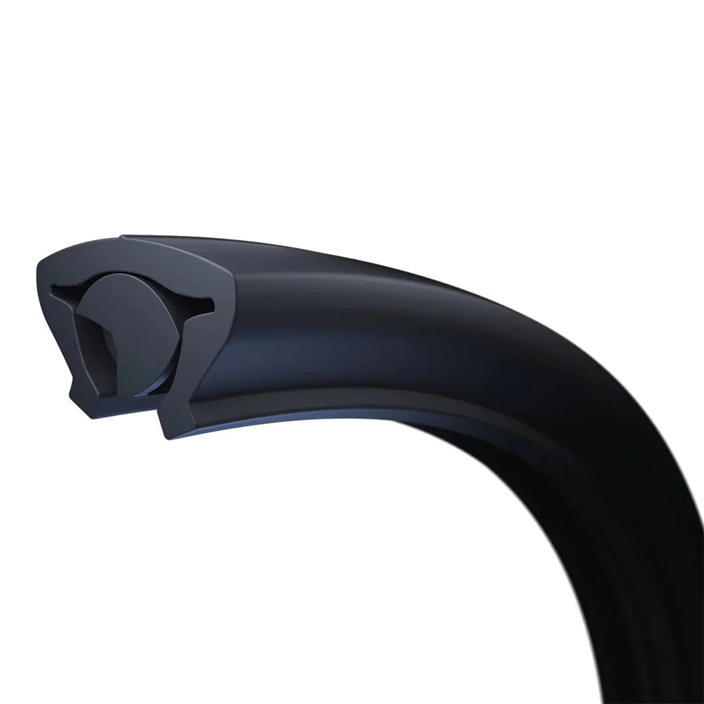 A close-up view of a Tannus Fusion bicycle tire, highlighting its unique puncture-resistant design and hybrid foam-rubber construction.